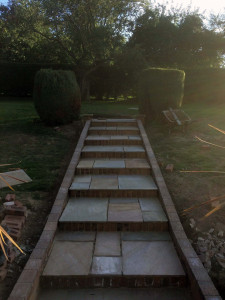 sand stone steps into garden